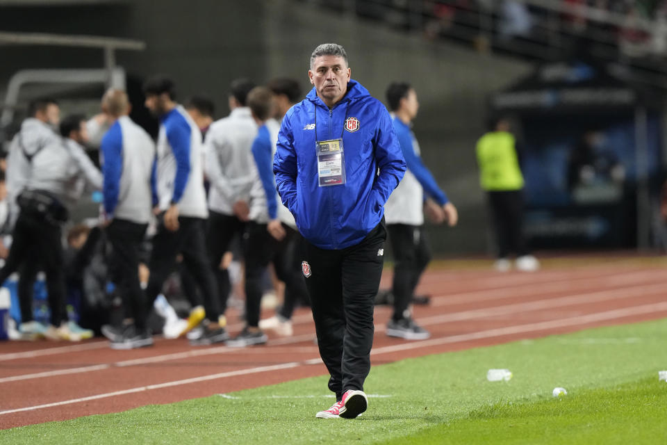 FILE - Costa Rica's head coach Luis Fernando Suarez walks on touchline during a friendly soccer match against South Korea in Goyang, South Korea, Friday Sept. 23, 2022. (AP Photo/Ahn Young-joon, File)