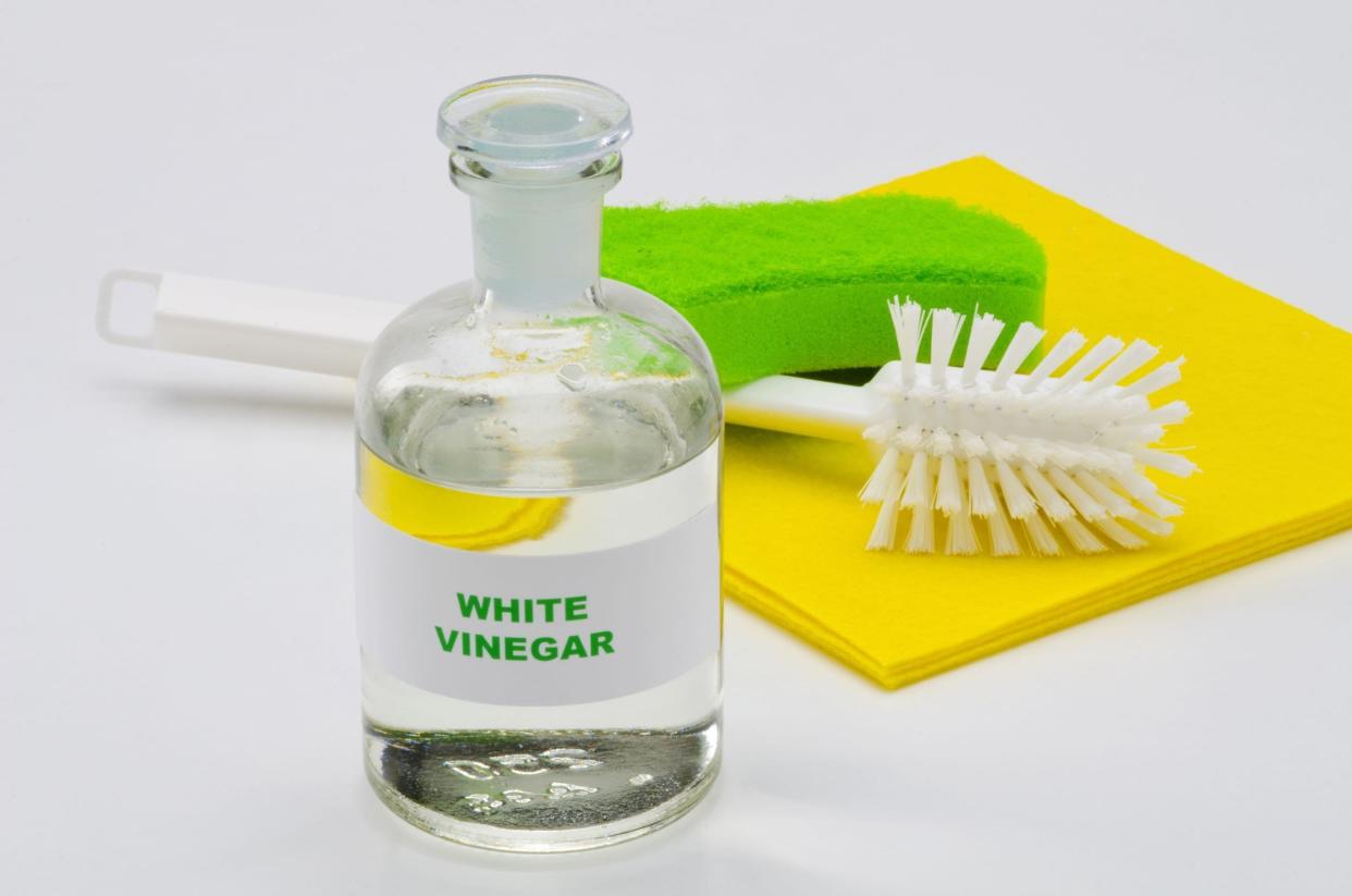 white vinegar in a glass bottle