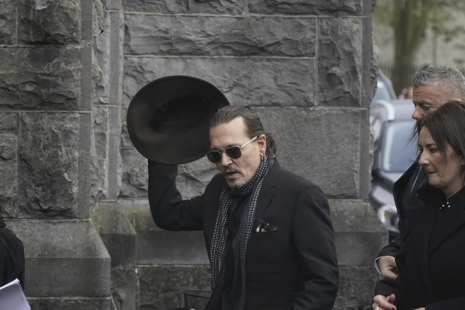 Johnny Depp arrives for the funeral of Shane MacGowan at Saint Mary's of the Rosary Church, Nenagh, Ireland, Friday, Dec. 8, 2023. MacGowan, the singer-songwriter and frontman of The Pogues, best known for their ballad “Fairytale of New York,” died on Thursday, Nov. 30, 2023. He was 65. (Niall Carson/PA via AP)