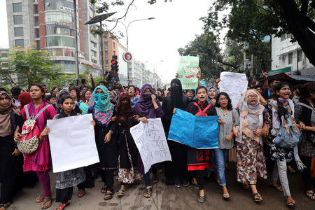 FILE PHOTO: Students shout slogan during a rally as they join in a protest over recent traffic accidents that killed a boy and a girl, in Dhaka, August 5, 2018. REUTERS/Mohammad Ponir Hossain