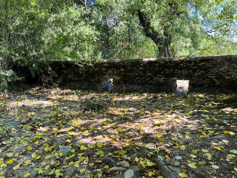 A general view of a weir and dried riverbed near the source of the River Thames, in Kemble