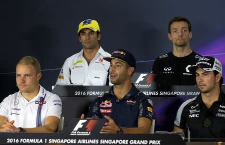 (L to R) Williams' Valtteri Bottas of Finland, Sauber's Felipe Nasr of Brazil, Red Bull's Daniel Ricciardo of Australia, Renault's Jolyon Palmer of Britain and Force India's Sergio Perez of Mexico at a news conference ahead of the Singapore F1 Grand Prix Night Race in Singapore, September 15, 2016. REUTERS/Jeremy Lee