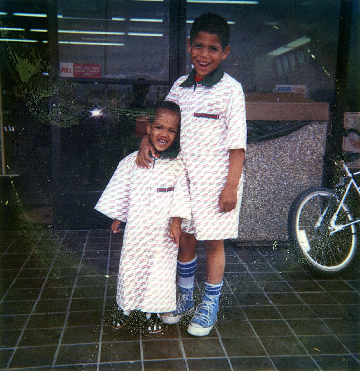 Kyle, right, and Nathan Woelfel around the time they moved to Wisconsin with their mother, Yvette, in 1989.