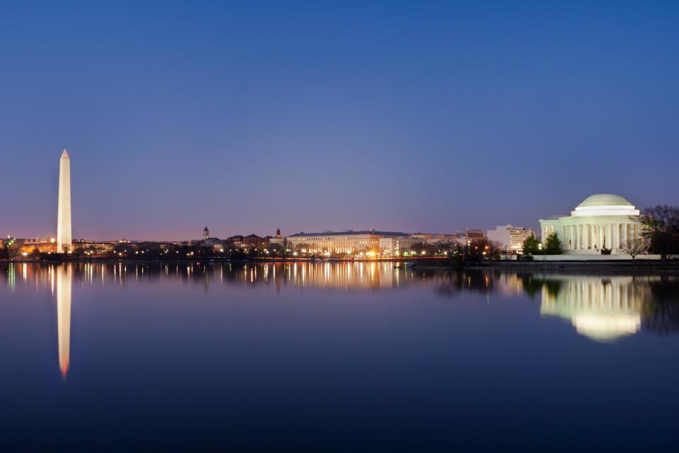 Washington DC National Mall, including Washington Monument and Thomas Jefferson Memorial with mirror reflections on water