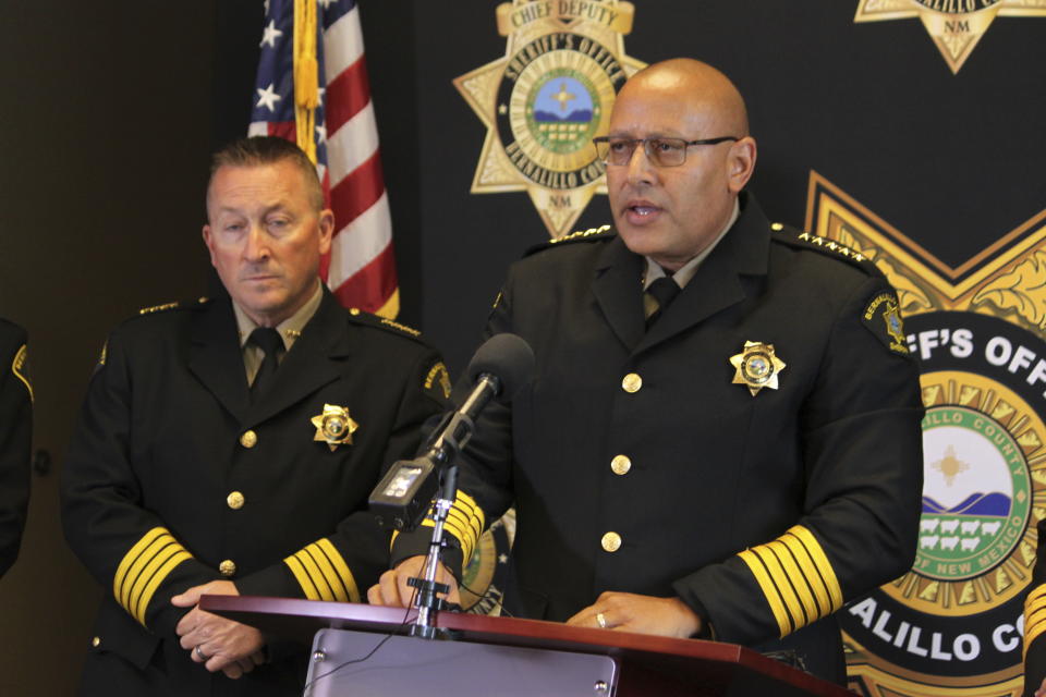 Bernalillo County Sheriff John Allen, right, is flanked by members of his leadership team as he calls New Mexico Gov. Michelle Lujan Grisham's order suspending the carrying of firearms in the state's most populous metropolitan area unconstitutional during a news conference in Albuquerque, New Mexico, on Monday, Sept. 11, 2023. Allen is among the other municipal law enforcement officials who have said they will not enforce the Democratic governor's order. (AP Photo/Susan Montoya Bryan)