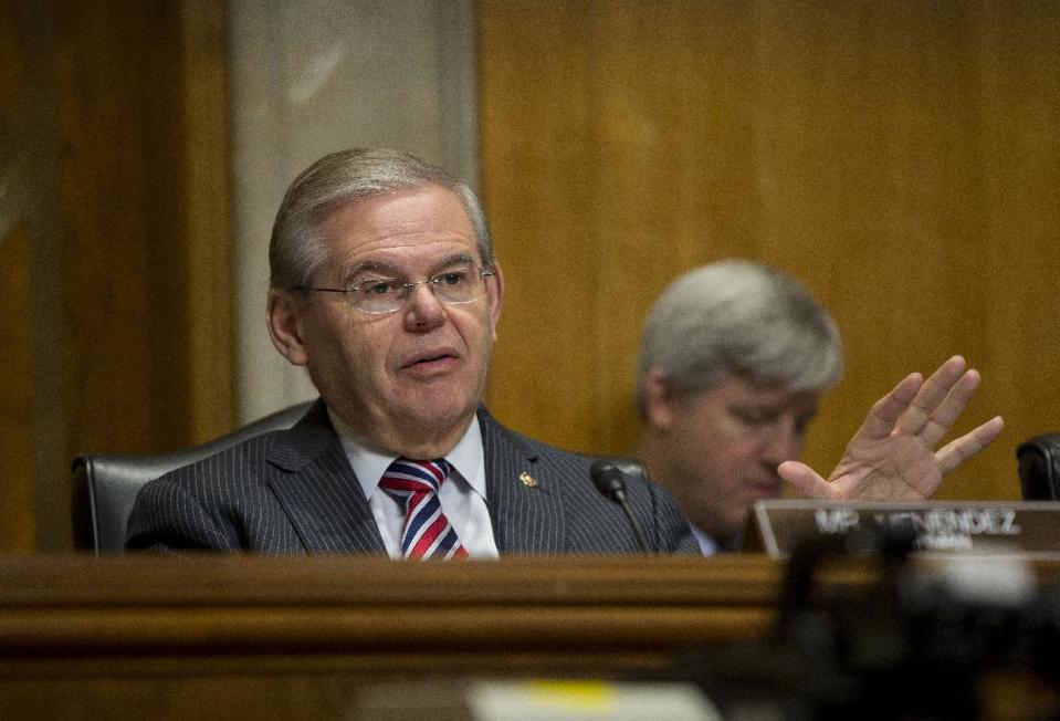 Senate Foreign Relations Committee Chairman Sen. Robert Menendez, D-N.J., questions Assistant Secretary of State for African Affairs Linda Thomas-Greenfield, and USAID Assistant Administrator for Bureau for Democracy Conflict and Humanitarian Assistance (DCHA), Nancy Lindborg, on Capitol Hill in Washington, Thursday, Jan. 9, 2014, during the committee's hearing on situation in South Sudan. (AP Photo/Pablo Martinez Monsivais)