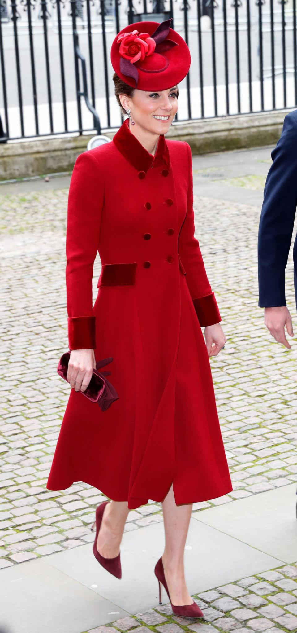 Kate Middleton wears a red coat in March 2020.