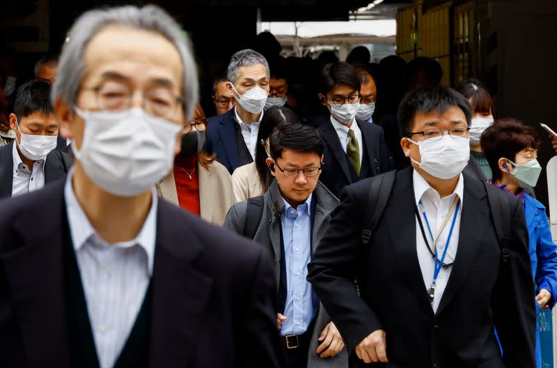 Japanese government relaxes official guidance on masks as it emerges from the COVID-19 pandemic, in Tokyo