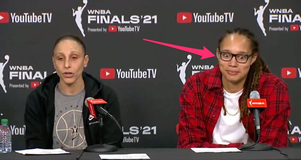 Brittney Griner reacts to Diana Taurasi answering a press conference question in Spanish.