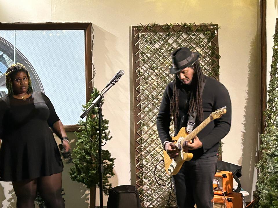 Jacquea Mae and Byron Nash entertaining at the Novel Noel benefit at the Carnegie Free Library of Beaver Falls.