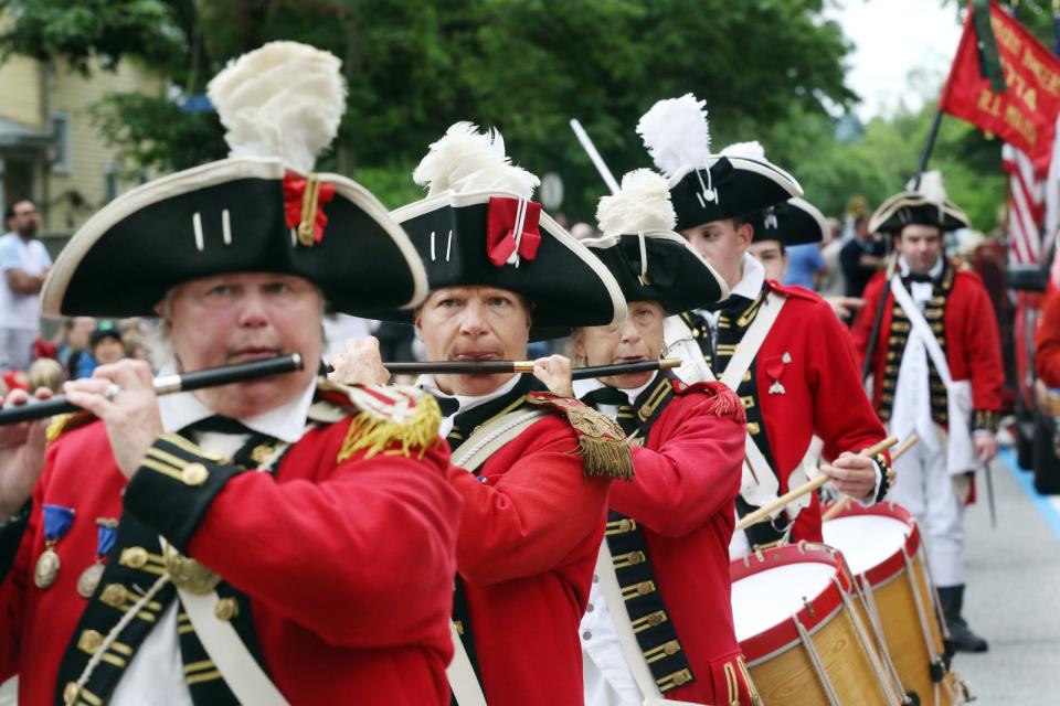 Members of the Pawtuxet Rangers perform in  Gaspee Days Parade in Warwick, a prelude to the ceremonial Burning of the Gaspee, commemorating the Colonial act of rebellion that helped spark the American Revolution.
