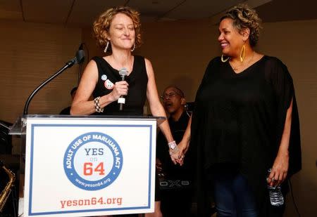 Yes on Prop 64 Lynne Lyman (L), Director of Drug Policy Action, and asha bandele (R), Senior Director of California Drug Policy Action, celebrate after Californians voted to pass Prop 64, legalizing recreational use of marijuana in the state, in Los Angeles, California, U.S. November 8, 2016. REUTERS/Jonathan Alcorn