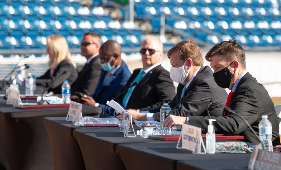 Escambia County Commissioner Robert Bender reads Nov. 17, 2020, from the agenda after taking over the chairmanship from Commissioner Steven Barry during the commission's installation ceremony at Blue Wahoos Stadium in this file photo.