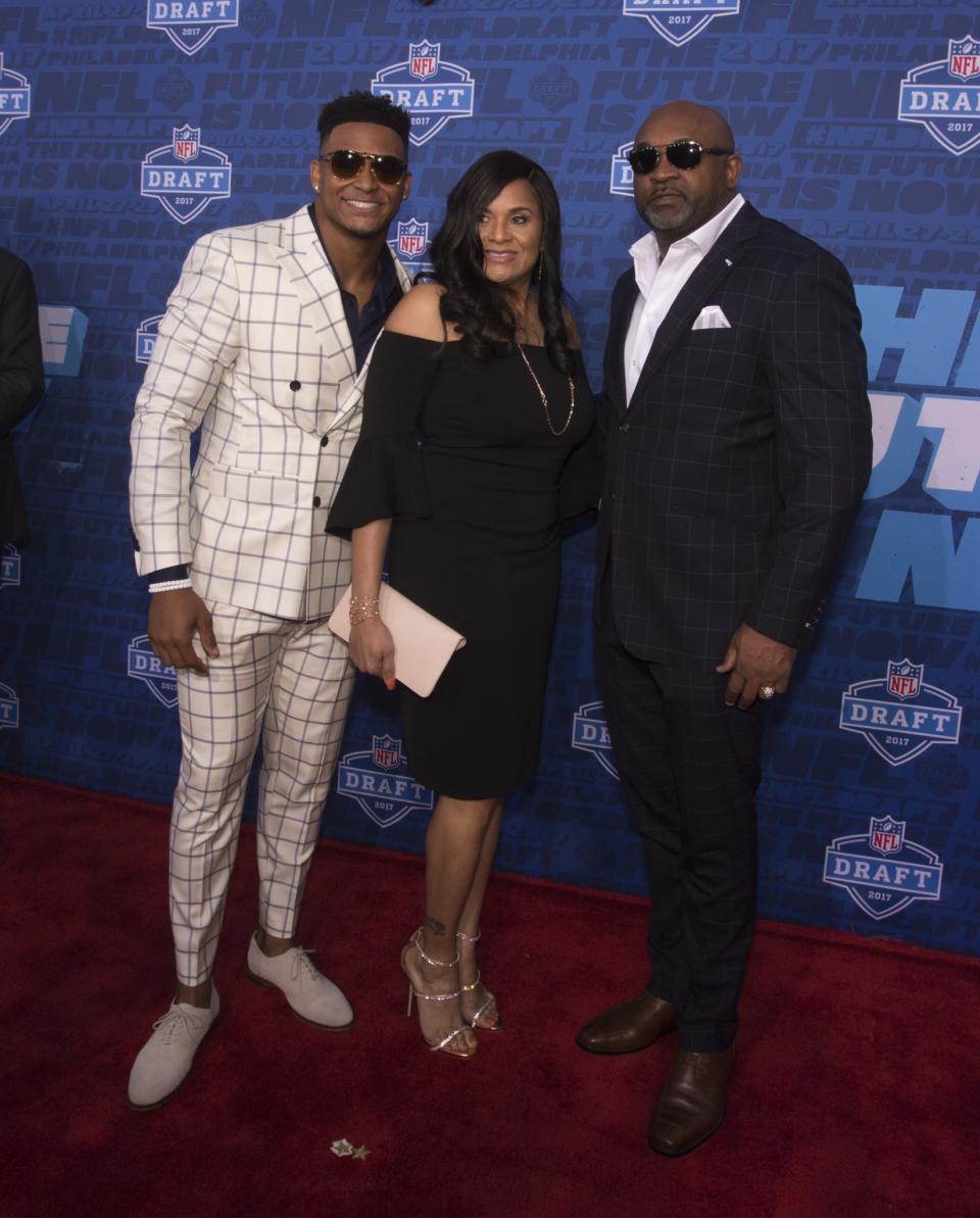 <p>Jamal Adams of LSU poses for a picture with his father George Adams and mother Michelle Adams on the red carpet prior to the start of the 2017 NFL Draft on April 27, 2017 in Philadelphia, Pennsylvania. (Photo by Mitchell Leff/Getty Images) </p>