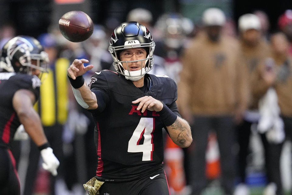 Atlanta Falcons quarterback Taylor Heinicke (4) throws a pass against the Minnesota Vikings during the first half of an NFL football game, Sunday, Nov. 5, 2023, in Atlanta. (AP Photo/Mike Stewart)
