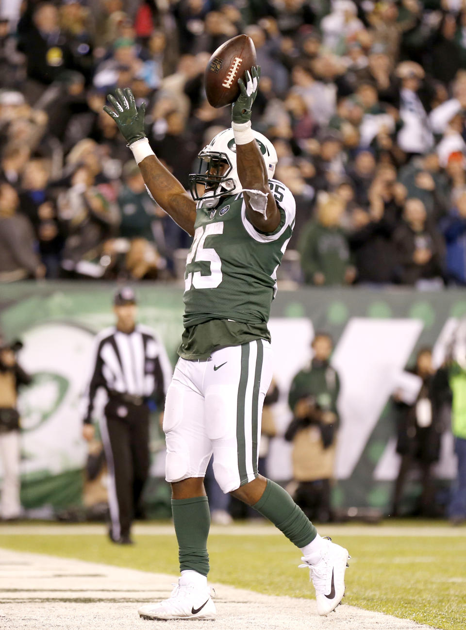 New York Jets running back Elijah McGuire celebrates his touchdown run against the Houston Texans during the second half of an NFL football game, Saturday, Dec. 15, 2018, in East Rutherford, N.J. (AP Photo/Adam Hunger)