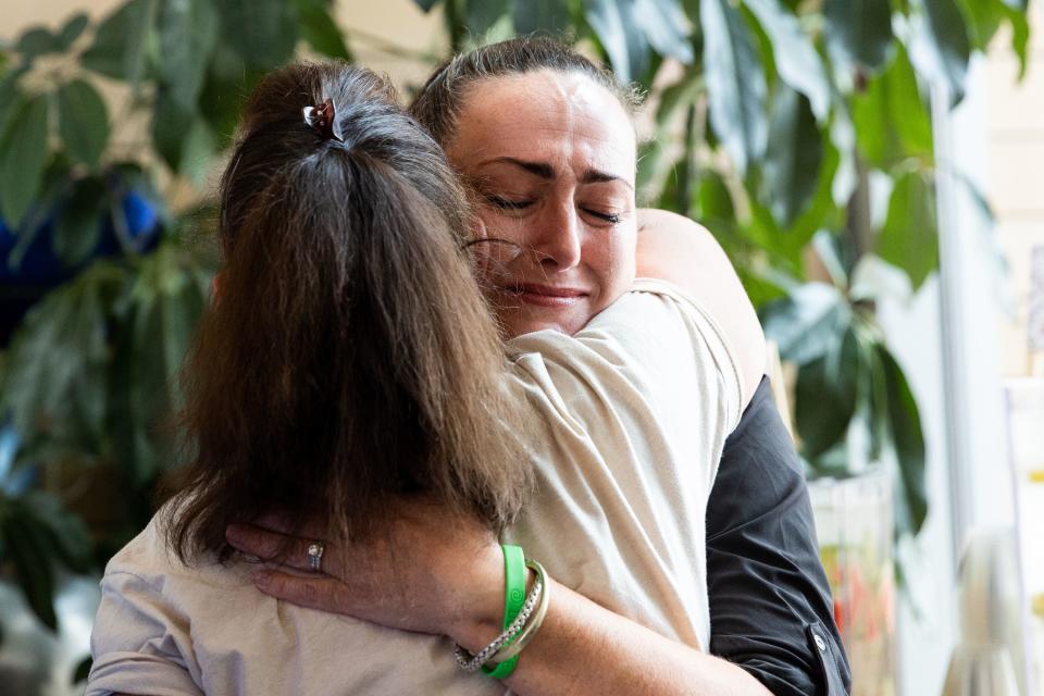 Ronda Henry, left, hugs Marley Bramble after Bramble shares her experience as a family member of an organ donor at an event held to celebrate the milestone of 600 lifesaving transplants by the Intermountain heart transplant team at the Intermountain Medical Center in Murray on Tuesday, July 18, 2023. | Megan Nielsen, Deseret News