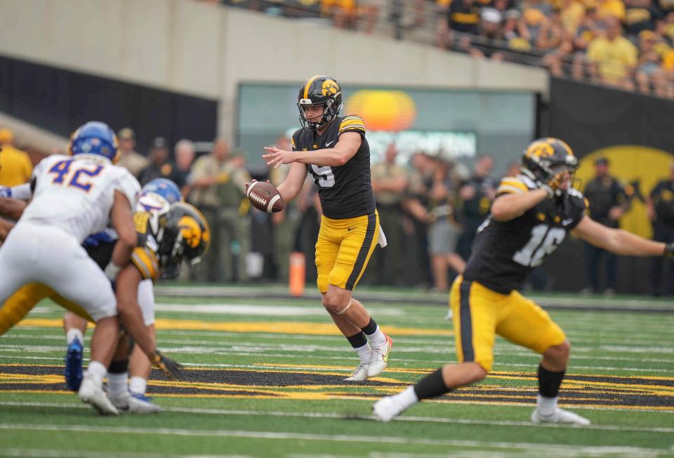 Iowa punter Tory Taylor punts the ball against South Dakota State during a NCAA football game on Saturday, Sept. 3, 2022, at Kinnick Stadium in Iowa City.