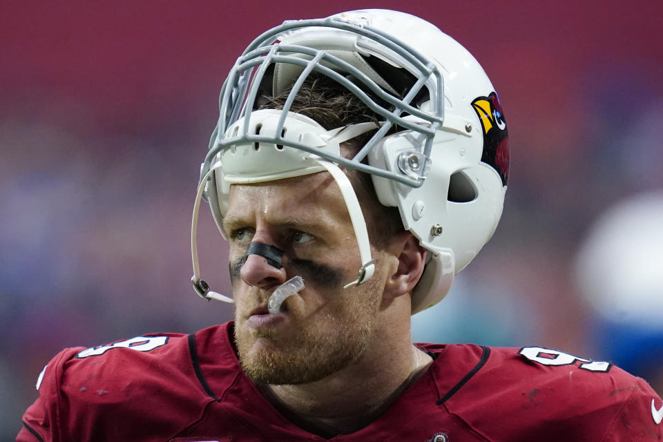 Arizona Cardinals defensive end J.J. Watt watches from the sidelines against the Minnesota Vikings during the first half of an NFL football game, Sunday, Sept. 19, 2021, in Glendale, Ariz. (AP Photo/Ross D. Franklin)