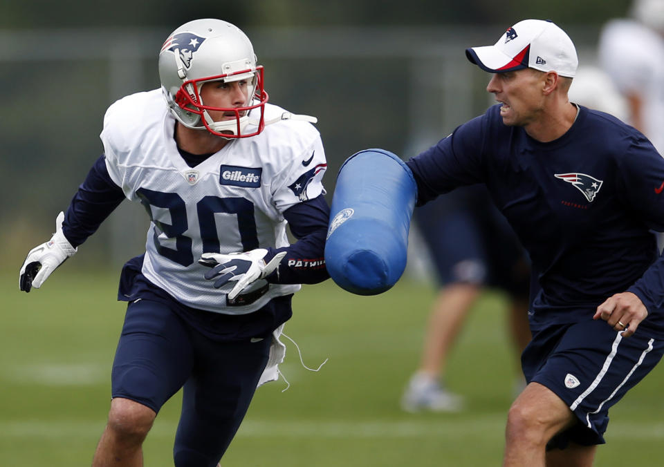 Patriots receiver Danny Amendola, left, and receivers coach Chad O’Shea, shown in 2013, first met over 20 years ago, when Amendola was a kid. (AP)