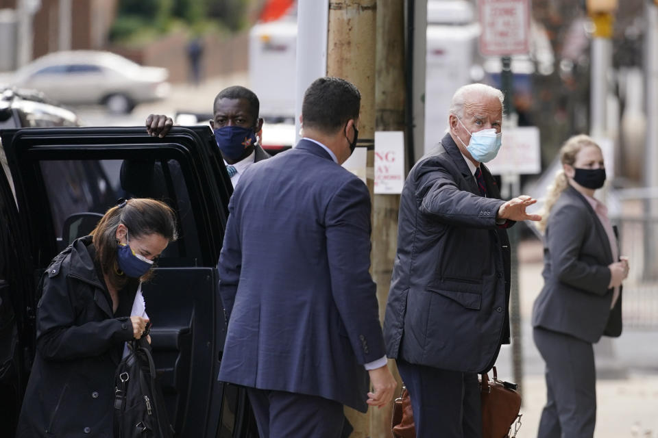 FILE - In this Nov. 17, 2020, file photo President-elect Joe Biden arrives with Avril Haines, former Deputy Director of the Central Intelligence Agency, left, at The Queen theater in Wilmington, Del. (AP Photo/Andrew Harnik, File)