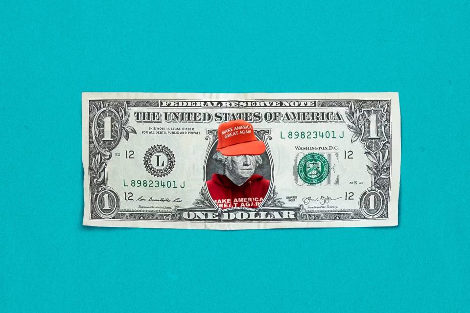 An image of a one dollar bill, in which George Washington is wearing a MAGA cap and hoodie.
