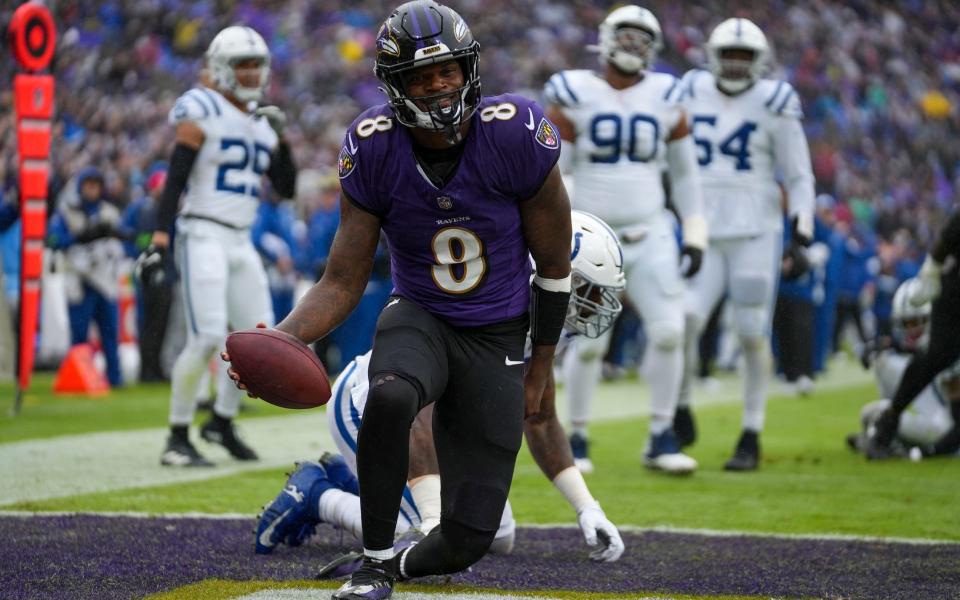 Baltimore Ravens quarterback <a class="link " href="https://sports.yahoo.com/nfl/players/31002" data-i13n="sec:content-canvas;subsec:anchor_text;elm:context_link" data-ylk="slk:Lamar Jackson;sec:content-canvas;subsec:anchor_text;elm:context_link;itc:0">Lamar Jackson</a> (8) smiles as he comes up with a first quarter touchdown on Sunday, Sept. 24, 2023, at M&T Bank Stadium in Baltimore.