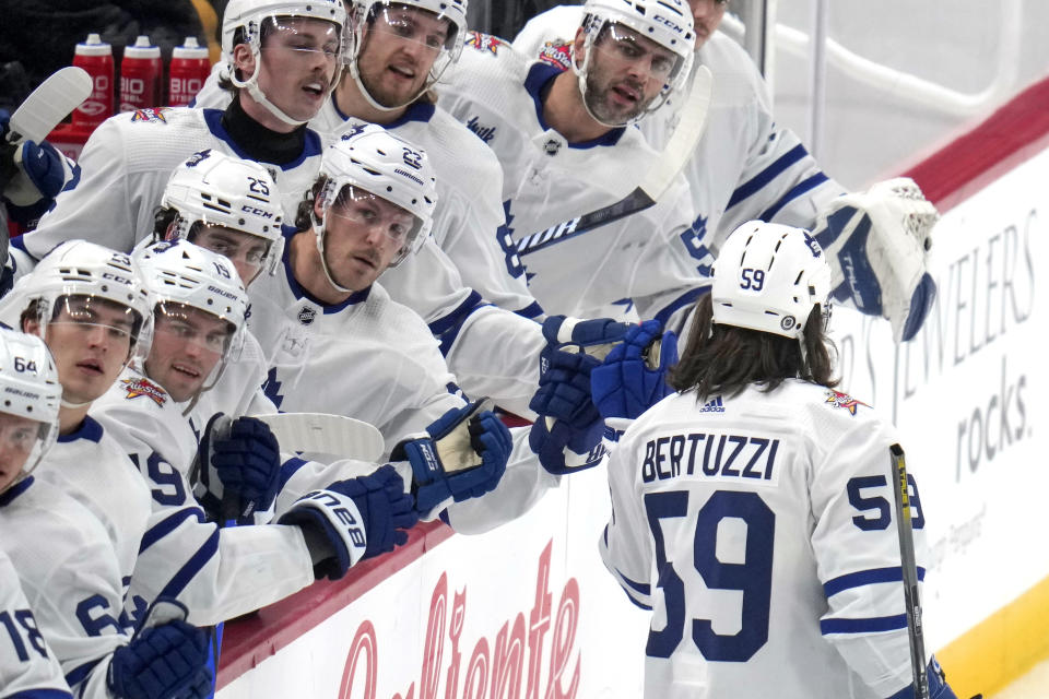 Toronto Maple Leafs' Tyler Bertuzzi (59) returns to the bench after scoring during the first period of an NHL hockey game against the Pittsburgh Penguins in Pittsburgh, Saturday, Nov. 25, 2023. (AP Photo/Gene J. Puskar)