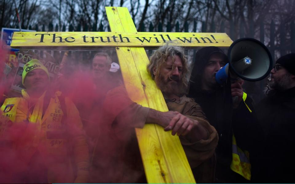 Assange's supporters protested outside the court on the first day of his extradition hearing