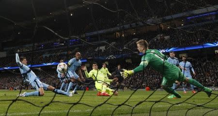 Football - Manchester City v FC Barcelona - UEFA Champions League Second Round First Leg - Etihad Stadium, Manchester, England - 24/2/15 Luis Suarez scores the second goal for Barcelona Reuters / Darren Staples Livepic EDITORIAL USE ONLY. - RTR4R0SB