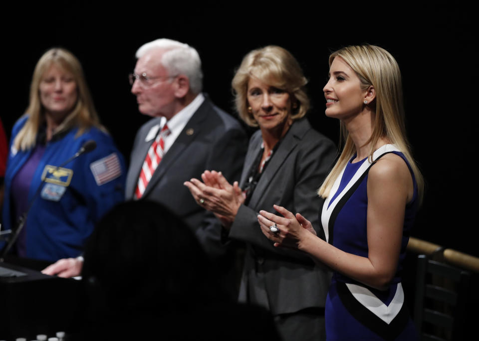 From right, Ivanka Trump, Education Secretary Betsy DeVos, John R. "Jack" Dailey, director of the National Air and Space Museum and NASA Astronaut Kay Hire, applaud at the Smithsonian's National Air and Space Museum in Washington, Tuesday, March 28, 2017, during an event to celebrate Women's History Month. (AP Photo/Manuel Balce Ceneta)