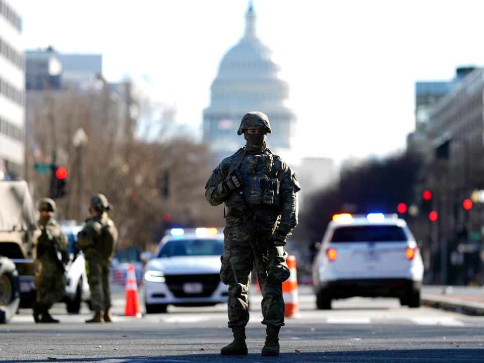 Some 25,000 National Guard troops have been brought in from across the country to ensure security on Inauguration Day amid security concerns following a pro-Trump mob’s attack on the Capitol on 6 JanuaryEPA