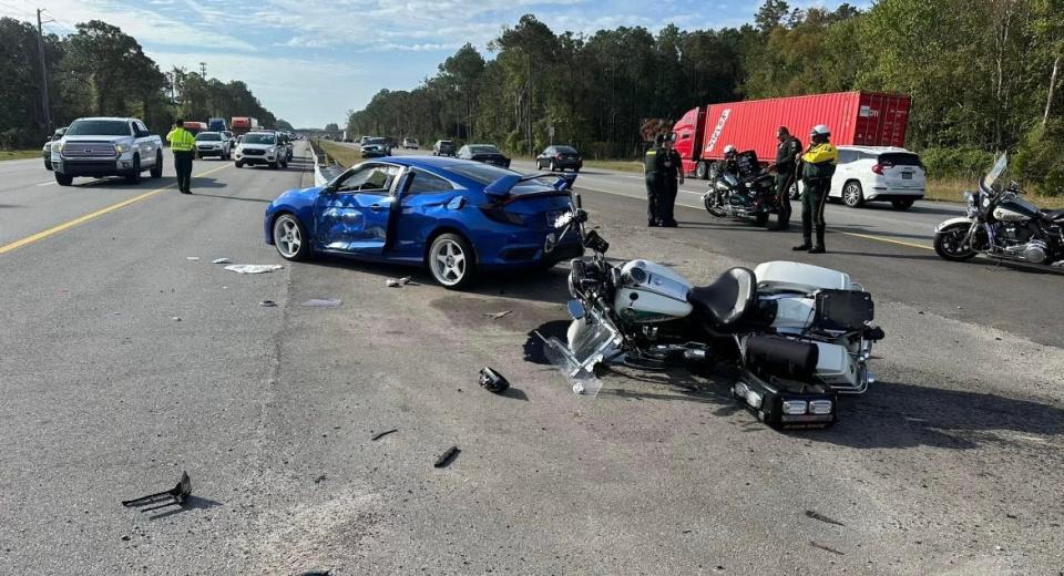 Flagler County Sheriff's Office Deputy First Class Benjamin Stamps was riding his patrol motorcycle to work on I-95 in St. Johns County when a car apparently crossed into his lane and collided with his motorcycle, the sheriff's office stated.