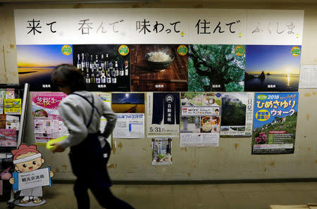 Posters promoting Fukushima sightseeing, are seen at the Fukushima prefectural government office in Fukushima, Fukushima prefecture, Japan May 18, 2018. Picture taken May 18, 2018. REUTERS/Toru Hanai