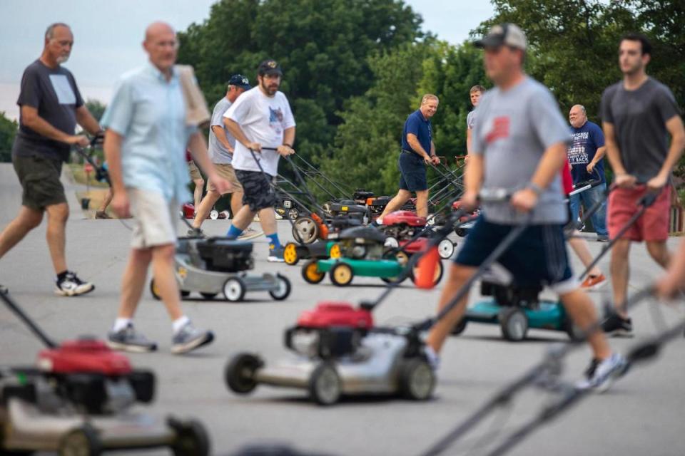 Members of this year’s Wilmore Lawnmower Brigade range in age from 13 to mid-70s. The group practiced its maneuvers on Thursday, June 30, 2022, in Wilmore, Ky.