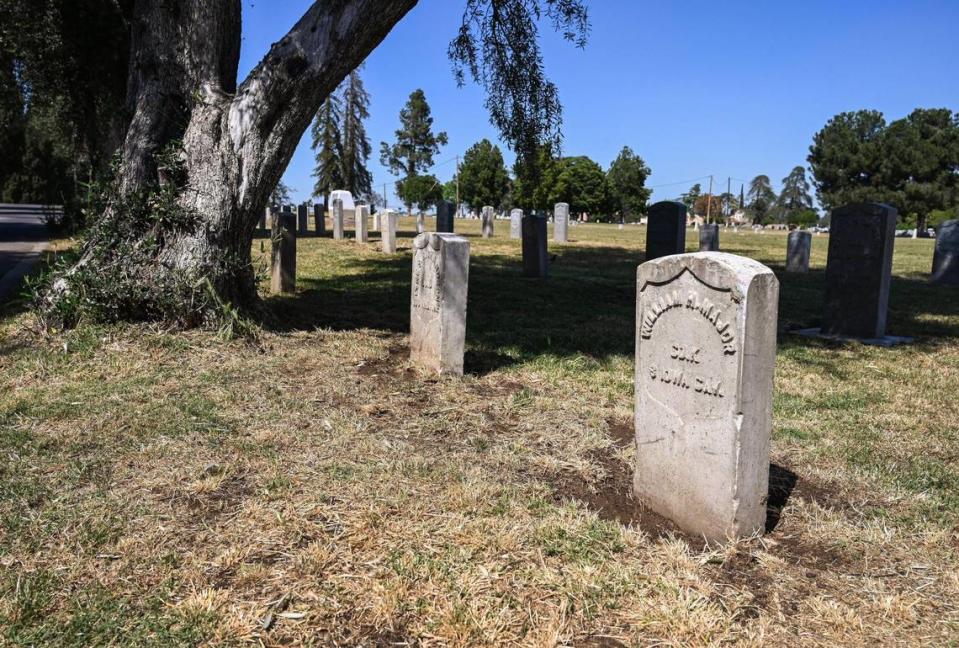 Civil War veterans headstones stand in the Civil War section of the Veterans Liberty Cemetery in Fresno on Friday, April 28, 2023.