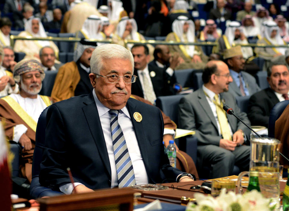 Palestinian President Mahmoud Abbas attends the closing session of the Arab League Summit at Bayan Palace, Kuwait, Wednesday, March 26, 2014. (AP Photo/Nasser Waggi)