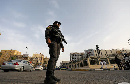 A member of the special police forces stands guard in Cairo, Egypt April 28, 2017. Picture taken April 28, 2017. REUTERS/Mohamed Abd El Ghany