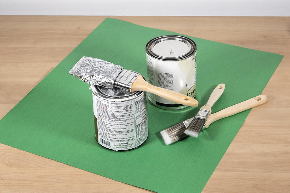 Aluminum foil keeps a paint brush from drying out