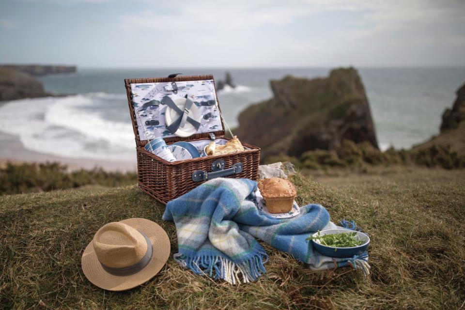 <p><strong>Inspired by Stackpole in Wales and Murlough Bay in Northern Ireland, the new outdoor summer dining collection from the National Trust will get you in the mood for the warm days to come.</strong> </p><p>The attractive prints featured on the items, ranging from mugs to picnic baskets, reflect the beauty of the British landscape in summer, including seagulls, the blues of the sea, and botanicals. As always, 100 per cent of the profits from every purchase supports the conservation work undertaken by the charity. All items are available now via selected National Trust stores or online at <a rel="nofollow noopener" href="https://shop.nationaltrust.org.uk/" target="_blank" data-ylk="slk:nationaltrust.org.uk/shop;elm:context_link;itc:0;sec:content-canvas" class="link ">nationaltrust.org.uk/shop</a>.</p>