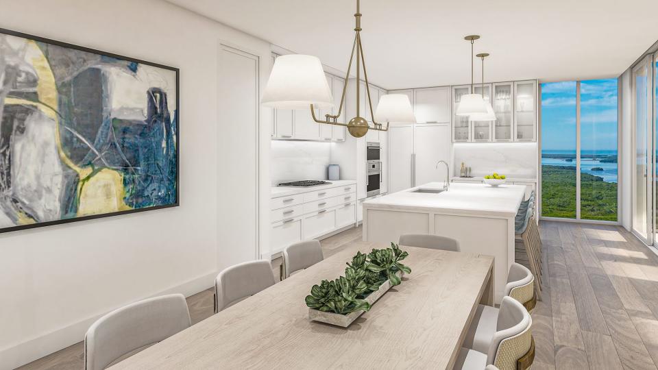 Designer-coordinated kitchens in The Island at West Bay Club residences feature European cabinetry, quartz countertops, and ultra-premium panel-ready integrated appliances, plus a combination of gas and induction cooktops, beverage entertainment areas and a walk-in pantry.