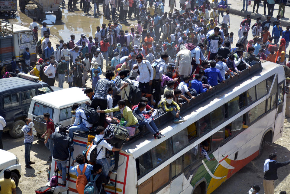 GHAZIABAD, INDIA - MARCH 28: An aerial view of Lal Kuan bus stand where a wave of migrant workers was seen following Uttar Pradesh governments call to arrange buses for the workers returning to their native state, on Day 4 of the 21 day nationwide lockdown -- to check the spread of coronavirus, on March 28, 2020 in Ghaziabad, India. (Photo by Sakib Ali/Hindustan Times via Getty Images)