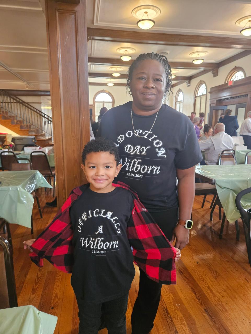 Yetta Wilborn celebrated with her newly adopted son, 6-year-old Alex Wilborn and her extended family at Hattiesburg Cultural Center after a mass adoption ceremony at Forrest County Courthouse, Monday. Nine families welcomed their new children just before the holidays.