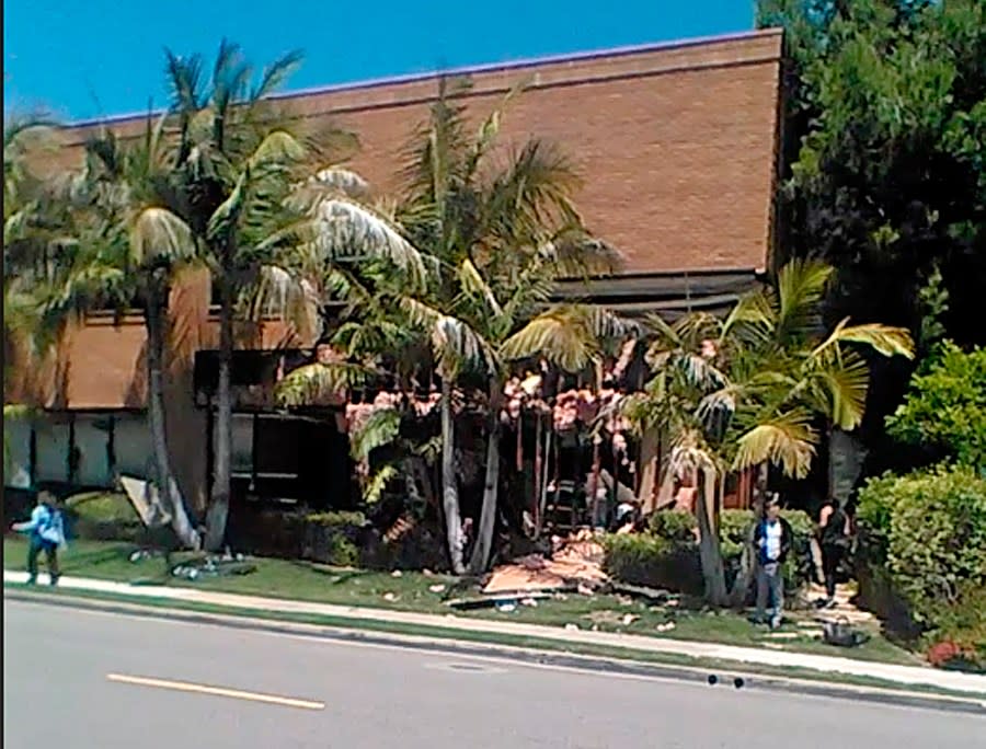 FILE – This May 15, 2018, file image taken from cellphone video shows a building after a fatal explosion in Aliso Viejo, Calif. Stephen Beal, who was released in 2018 after his arrest on an explosives charge, was arrested Sunday, March 3, 2019, in connection with the May 15 bombing that killed Ildiko Krajnyak in her Orange County spa. Beal has been sentenced Friday, Jan. 19, 2024, to two life sentences to run concurrently, plus 30 years, for blowing up his ex-girlfriend’s spa business with a package bomb in 2018, killing her and seriously injuring two others. (Raul Hernandez via AP, File)