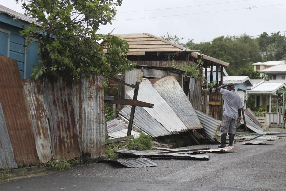 <p>A man surveys the wreckage on his property after the passing of Hurricane Irma, in St. John’s, Antigua and Barbuda, Wednesday, Sept. 6, 2017. (Photo: Johnny Jno-Baptiste/AP) </p>