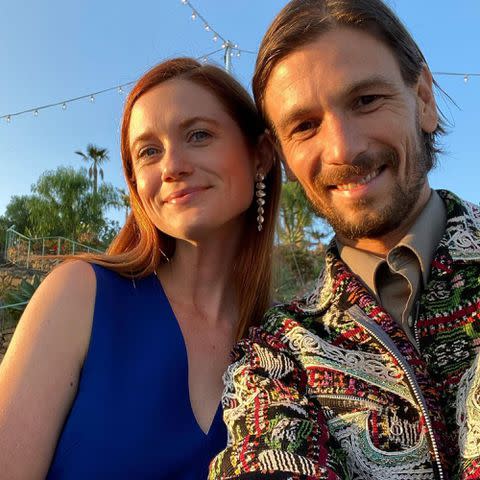 <p>Bonnie Wright Instagram</p> Bonnie Wright and Andrew Lococo pose together at the end of the year on Dec. 31, 2021.