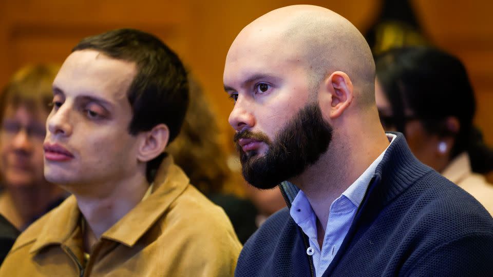 Christian Graber, right, the eldest son of slain Spanish teacher Nohema Graber, listens to testimony during the sentencing hearing of Jeremy Goodale at the Jefferson County Courthouse in Fairfield, Iowa. - Jim Slosiarek/The Gazette via AP