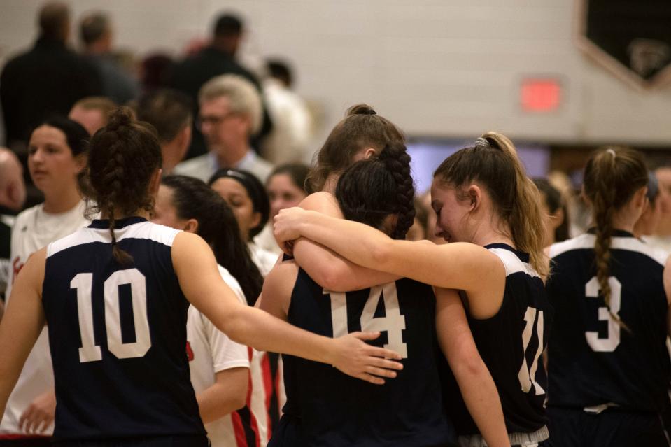 The Dallastown girls basketball team huddles after its loss against Pennsbury on Tuesday, March 8, 2022. Pennsbury girls basketball defeated Dallastown, 62-46, in the first round of the PIAA Class 6A tournament.