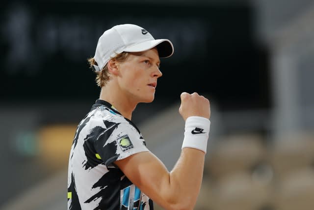 Jannik Sinner clenches his fist during his victory over David Goffin