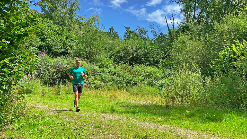 Man hiking in EDZ 135gsm merino T-shirt